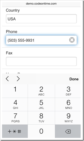 A 'phone number' keyboard is displayed when a 'phone' field is focused in a form view of a mobile app created with Code On Time mobile app generator.